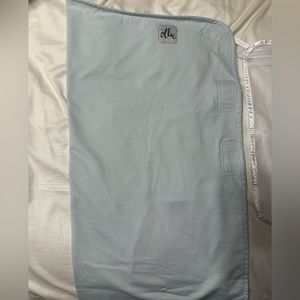 Ollie swaddle in light blue.